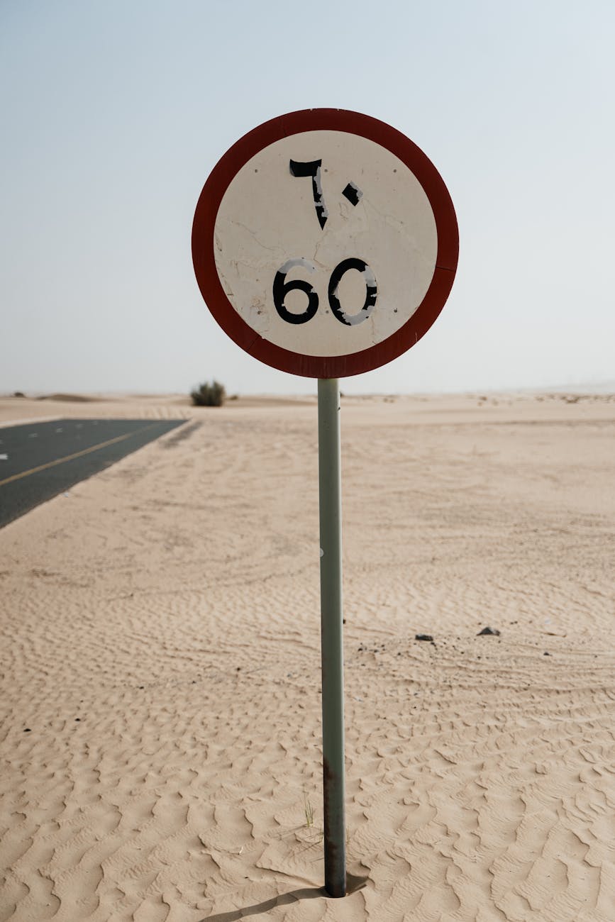 a road sign on a desert